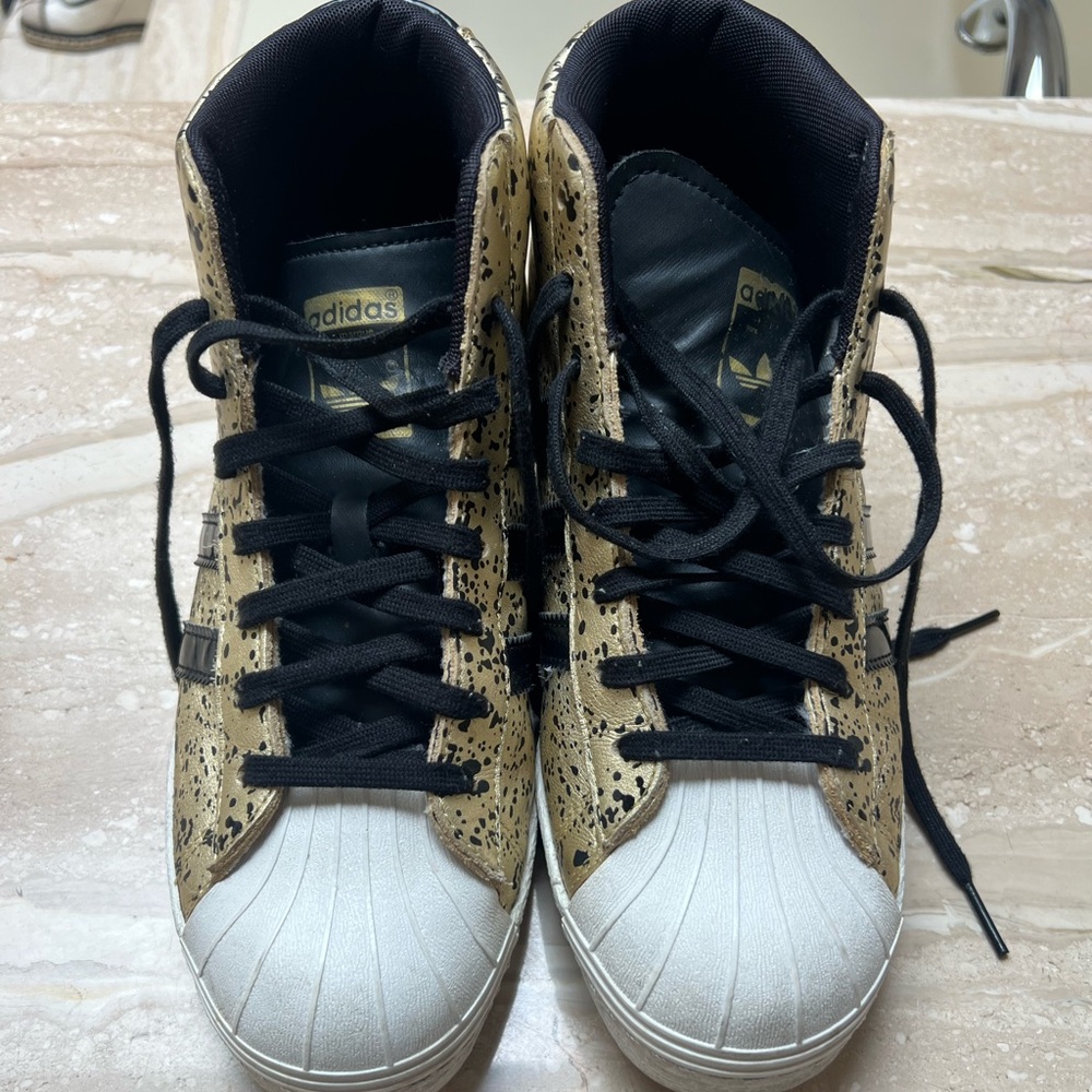 Adidas High-Tops in Black, Gold, and White